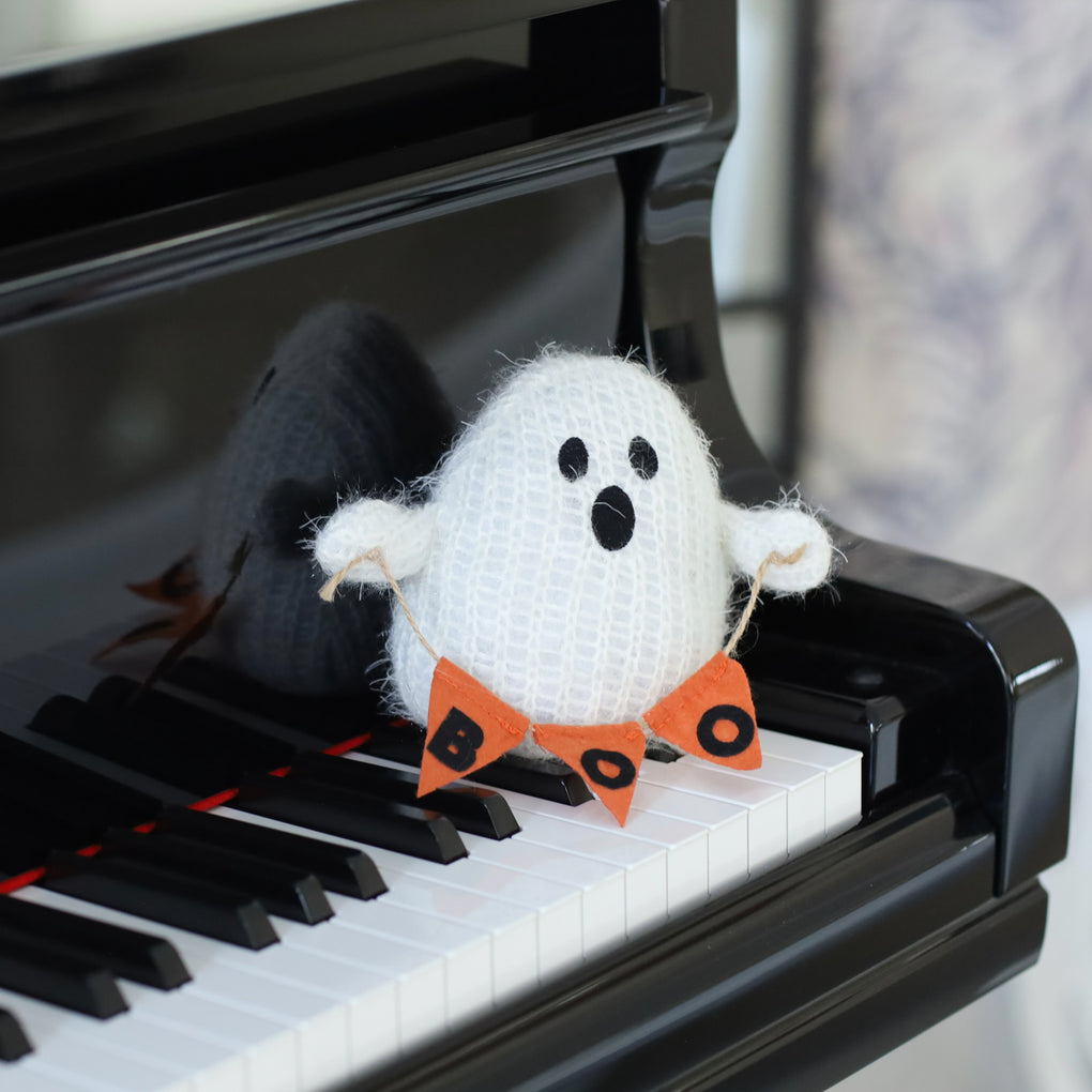 Halloween Ghost Carrying 'Boo'
